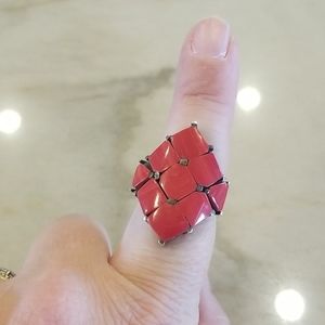 Coral colored stone and sterling silver ring